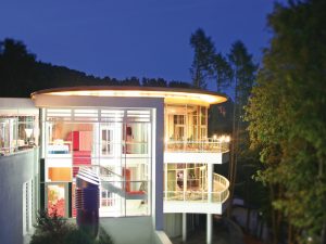 A nightly view of the iluminated CAMPUS terrace, a part of the conference services of the hotel SCHWARZWALD PANORAMA